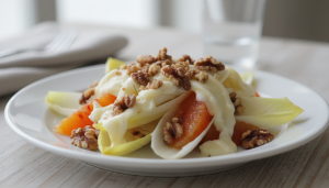 découvrez notre recette de délice d’endives croquantes associées à l’orange juteuse, aux noix grillées et au fromage de brebis fondant pour une harmonie parfaite de saveurs.