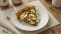 savourez une délicieuse tarte gourmande aux champignons frais et au fromage fondant, parfaite pour un repas convivial et réconfortant.